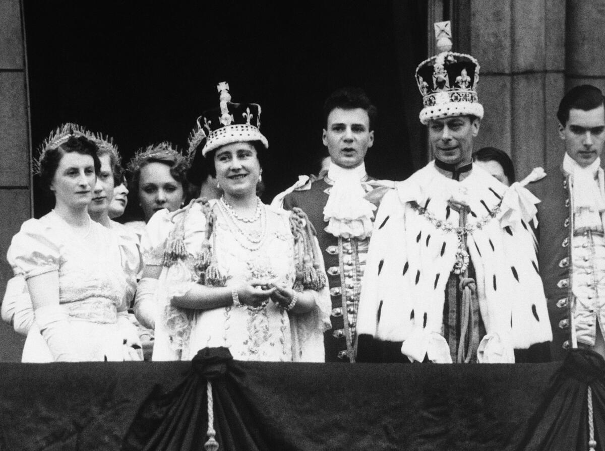 King George VI and Queen Elizabeth at Buckingham Palace after the 1937 coronation.
