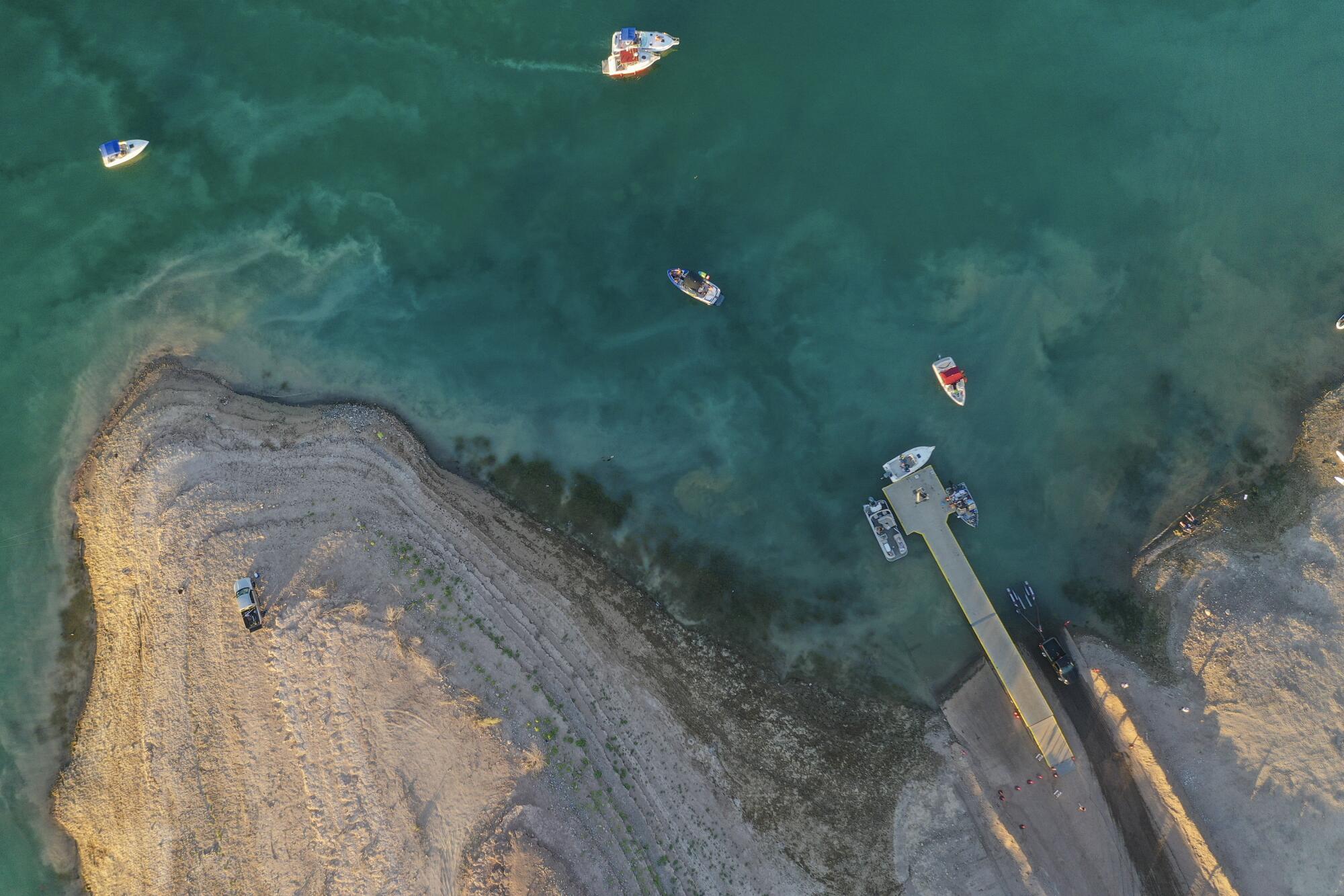 An aerial view of a boat launch ramp on the lake