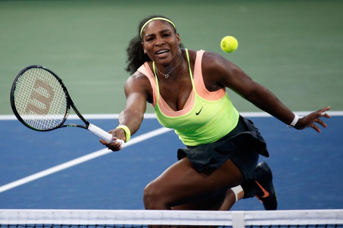 Serena Williams volleys a return against Elina Svitolina in a semifinal match of the Western & Southern Open on Saturday.