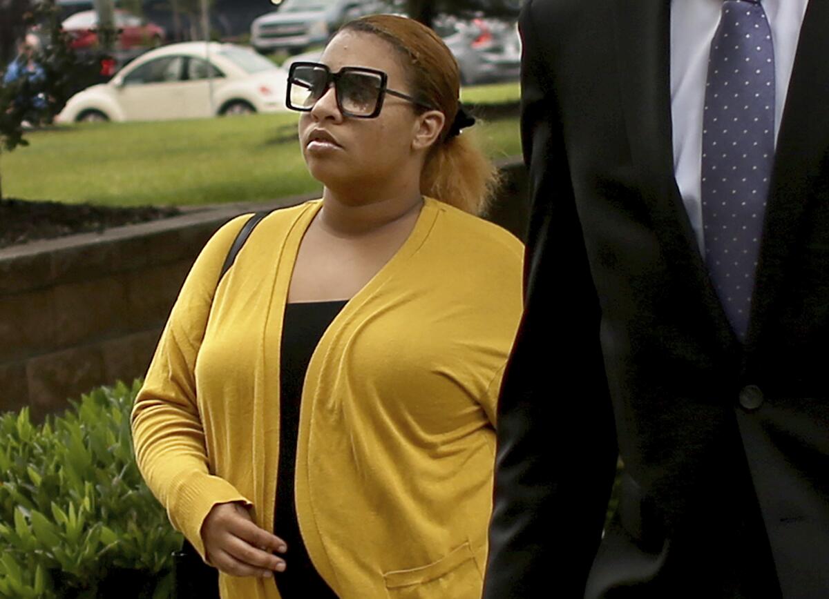Deja Taylor arrives at federal court