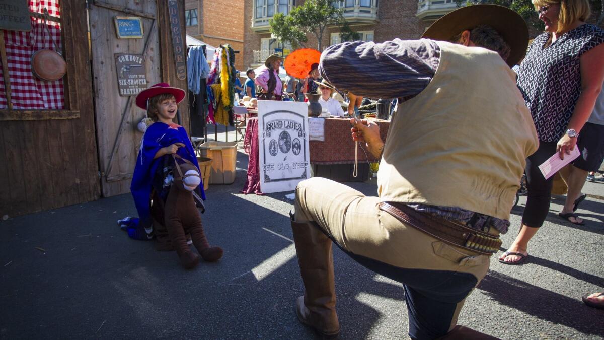 The annual Fall Back Festival in the Gaslamp provides old western fun and games and free food for kids.