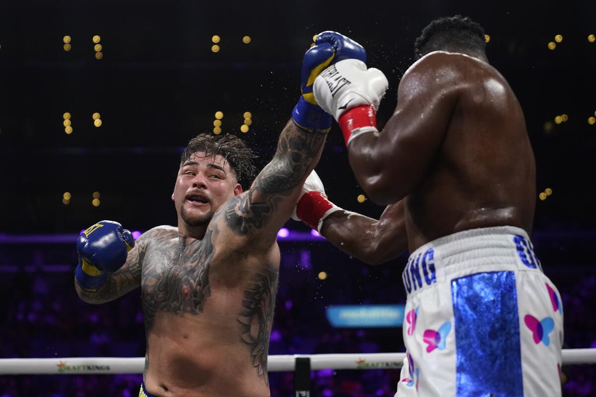 Andy Ruiz, Jr., left, throws a punch during his victory by unanimous decision over Luis Ortiz on Sunday.