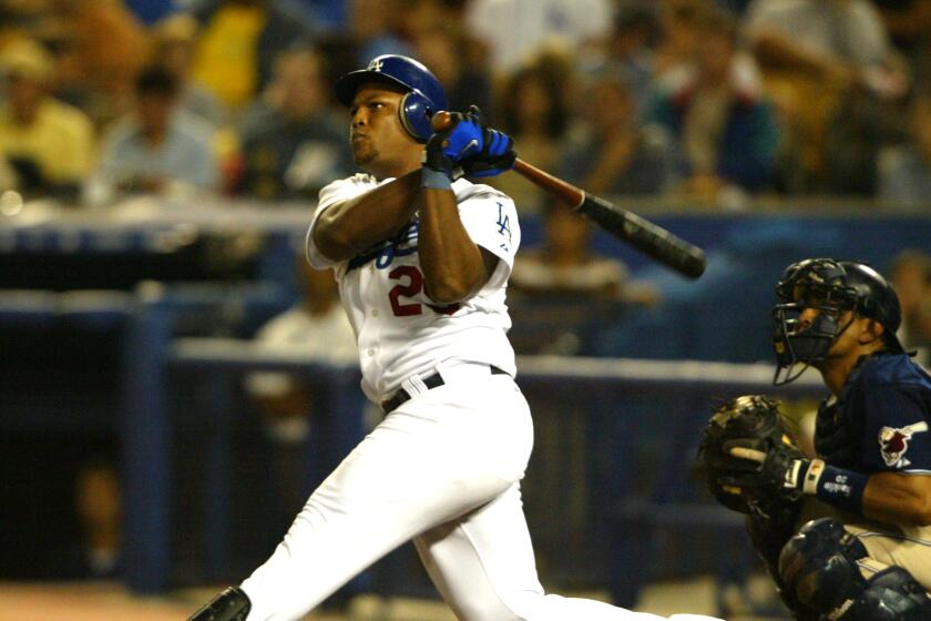 Dodgers' Adrian Beltre hits a walkoff home run against the San Diego Padres on  July 23, 2004.