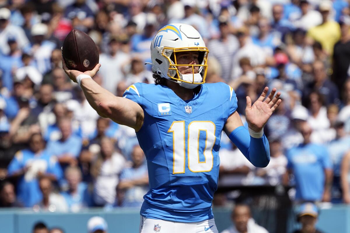 Chargers quarterback Justin Herbert throws against the Tennessee Titans in the first half.
