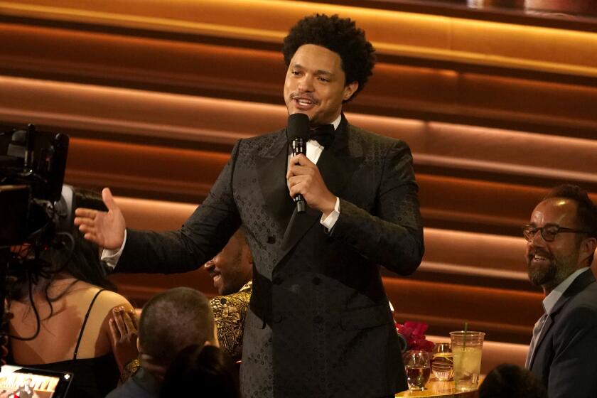 Host Trevor Noah speaks at the 64th Annual Grammy Awards on Sunday, April 3, 2022, in Las Vegas. (AP Photo/Chris Pizzello)