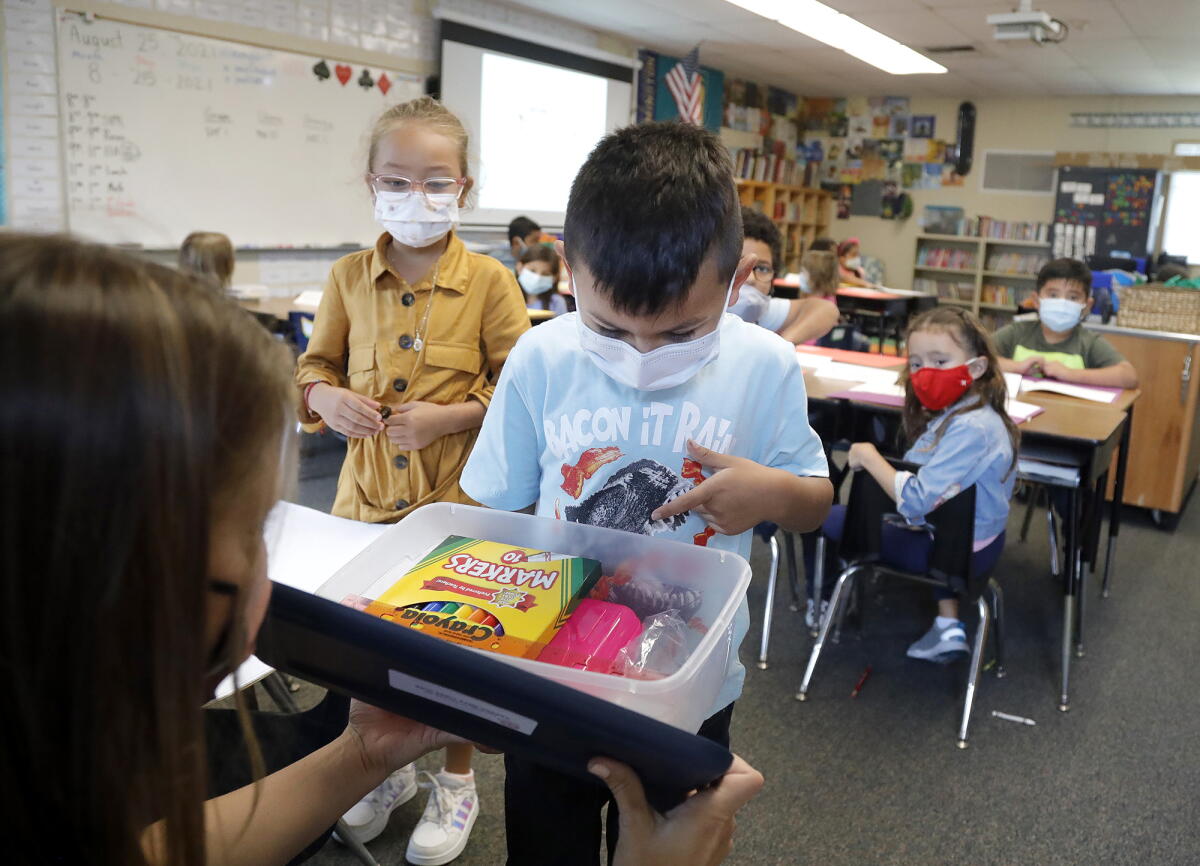 Area firstgraders receive gift of 'school boxes' courtesy of Harbor
