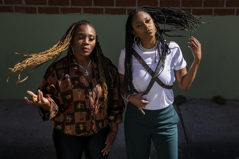 LOS ANGELES, CA - AUGUST 10: Denisia OBlu JuneO Andrews and Brittany OChiO Coney pose together in Hollywood on Monday, Aug. 10, 2020 in Los Angeles, CA. The duo makes up Nova Wav, the songwriter/production duo behind Beyonc's OBlack Parade." (Josie Norris / Los Angeles Times)