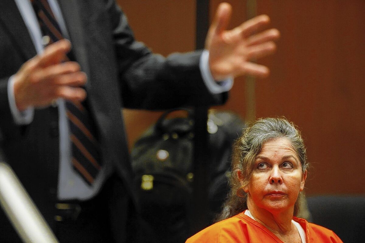 Former Bell assistant city manager Angela Spaccia listens while her attorney Harland Braun argues on her behalf in Los Angeles Superior Court during her sentencing hearing.