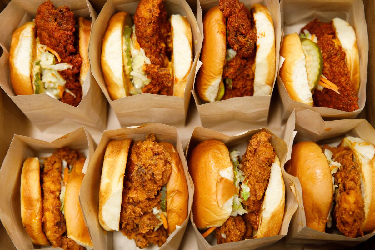 Nashville-style hot fried chicken sandwiches from Main Chick Hot Chicken are boxed up at Colony virtual kitchen.