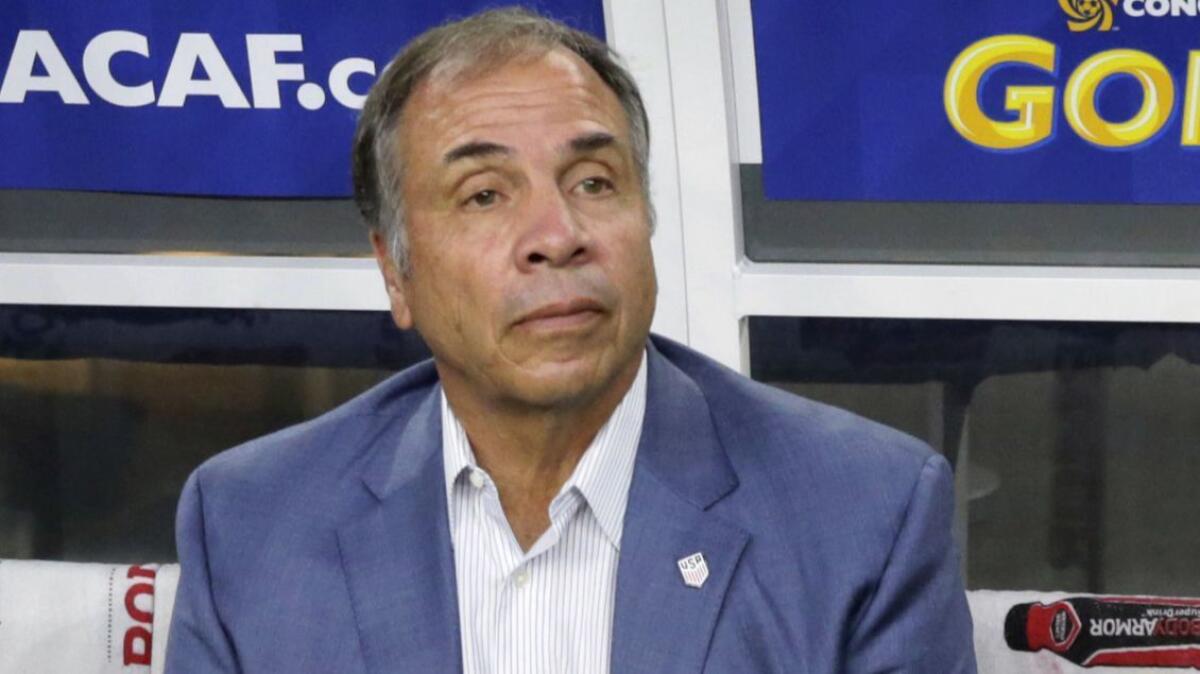 U.S. coach Bruce Arena sits on the bench prior to a CONCACAF Gold Cup match against Costa Rica on July 22, 2017, in Arlington, Texas. The New England Revolution have hired Arena as their coach and sports director.