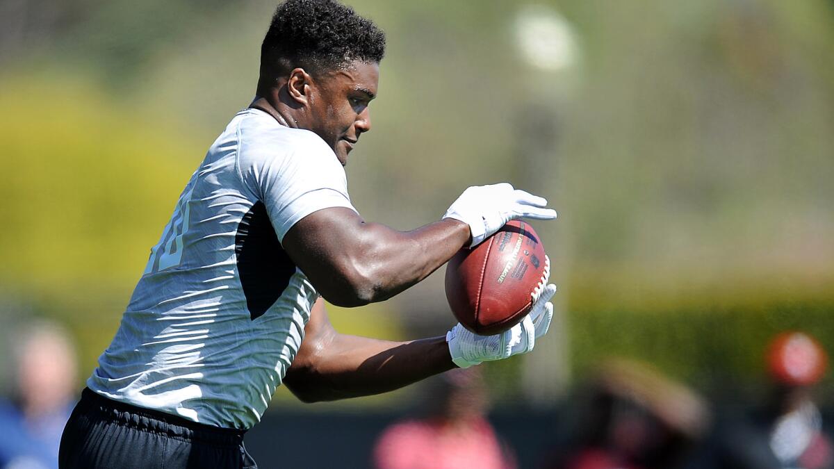 Myles Jack performs a drill for scout during UCLA's pro day last month.