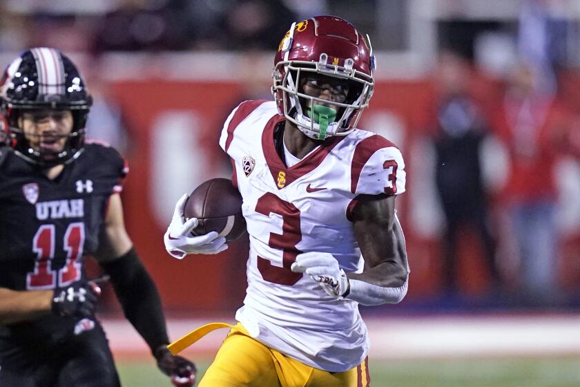 Southern California wide receiver Jordan Addison (3) carries the ball against Utah.