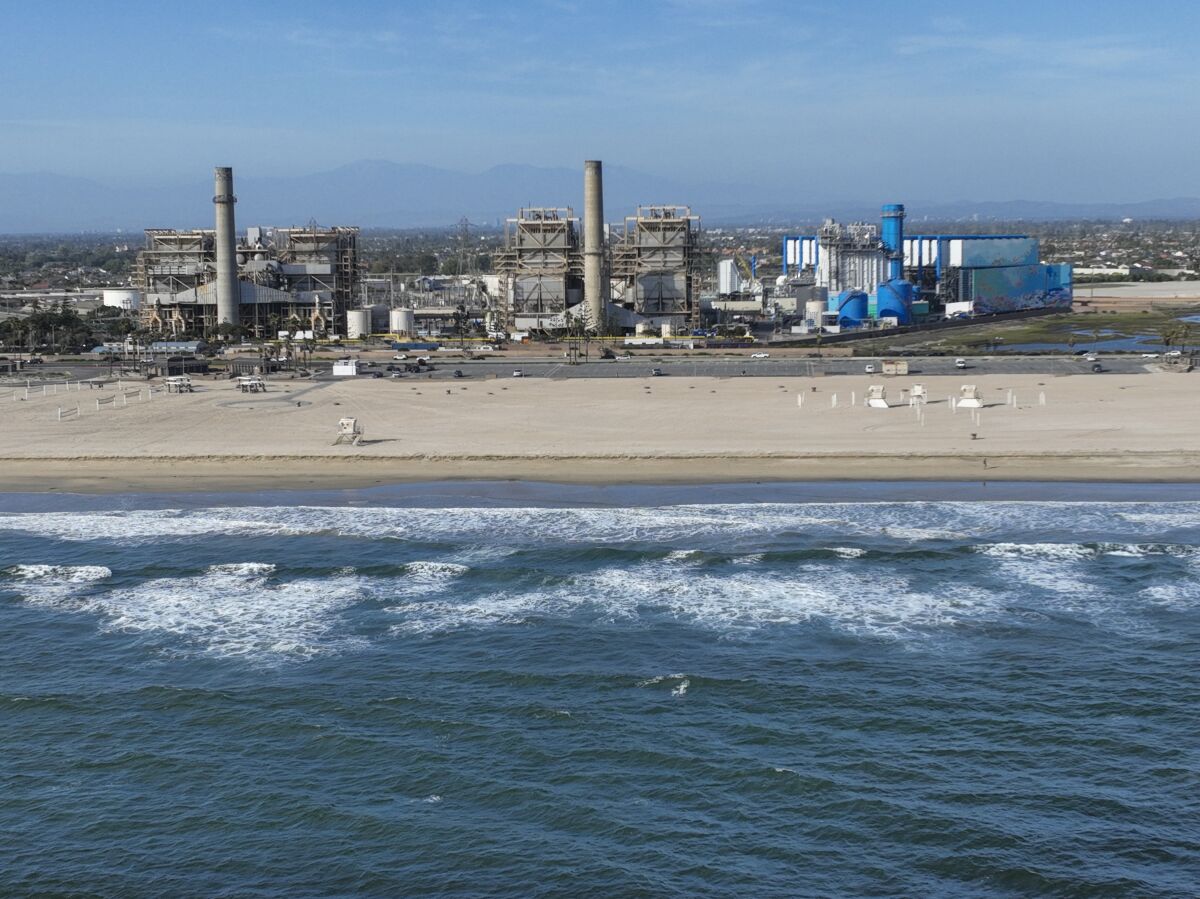 An aerial view of a beachside industrial site