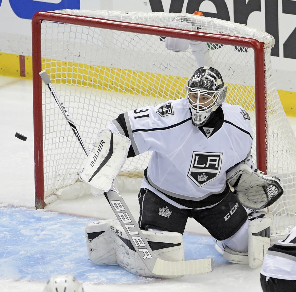 Kings goalie Peter Budaj (31) makes a save during the first period against the Pittsburgh Penguins on Dec. 16.