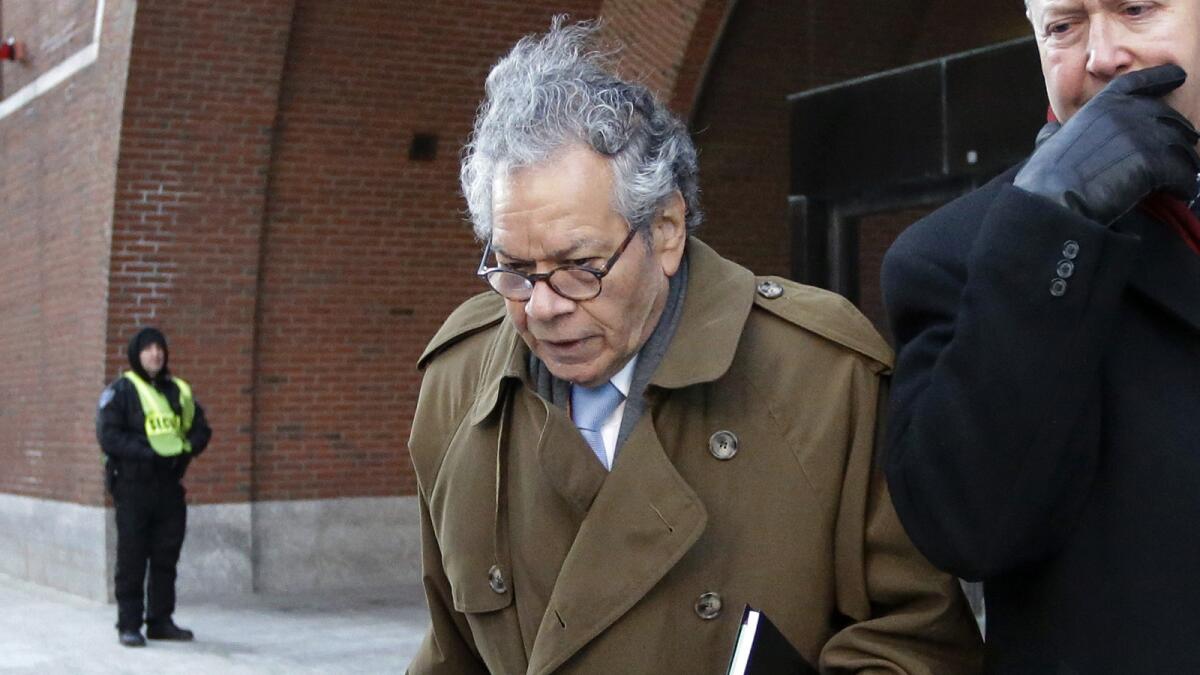 Insys Therapeutics founder John Kapoor leaves federal court in Boston in January.