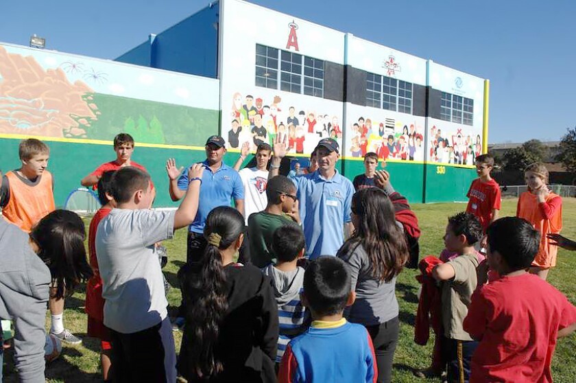 Kids in the Pure Game program practice self-control through an activity called "walking soccer."