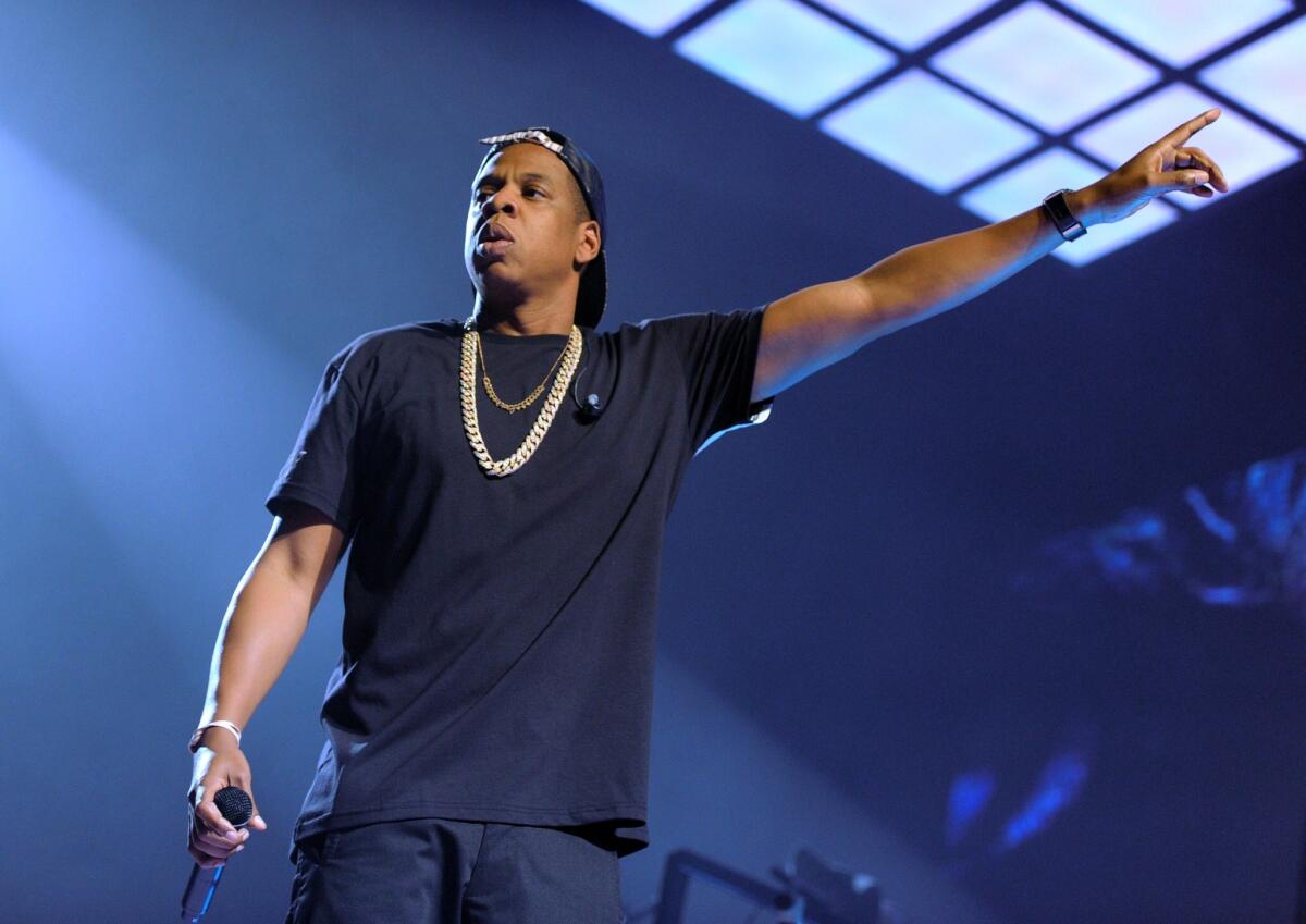 Jay Z, shown performing in October, is consulting with Barneys New York about racial profiling.