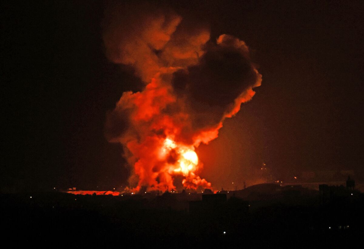 A fire rages following an Israeli air strike on the Gaza Strip on May 11. 