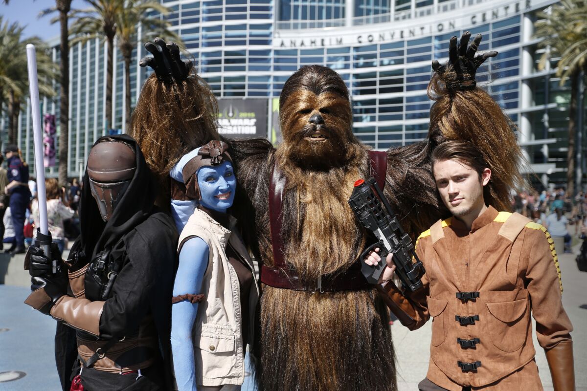 Attendees cosplay at Star Wars Celebration 2015.