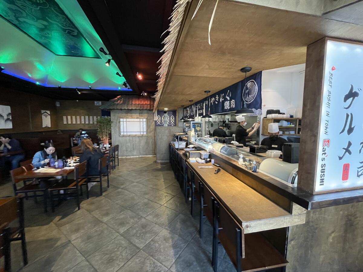 An empty bar is the norm at Eat's Sushi in Costa Mesa.