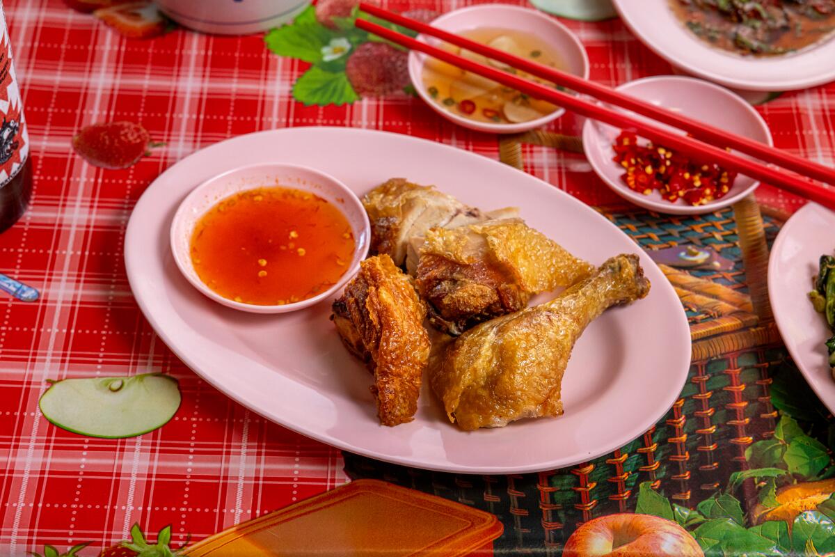 LOS ANGELES, CA - NOVEMBER 1, 2023: Kai Ho (Fry Dry aged Jidori chicken) from Holy Basil, a Thai street-food takeout window inside a Downtown Los Angeles food court, on Wednesday, Nov. 1, 2023. (Silvia Razgova / For The Times) 1368361-fo-101-2023-holy-basil