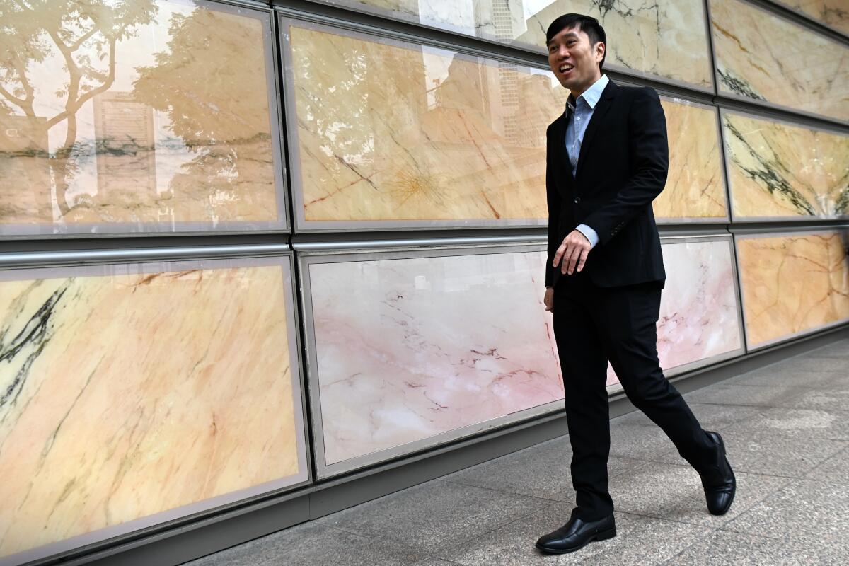 Singaporean activist Jolovan Wham leaves the High Court in Singapore in 2019.