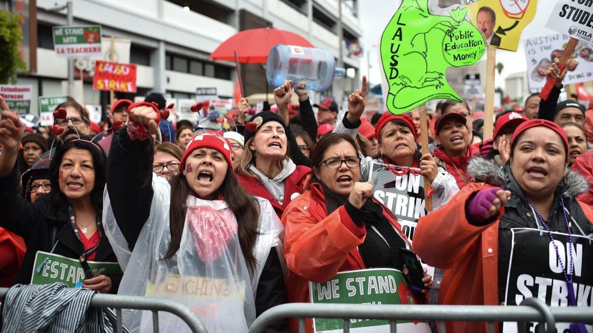 Striking teachers and their supporters rally in January outside the offices of the charter schools association in downtown Los Angeles.