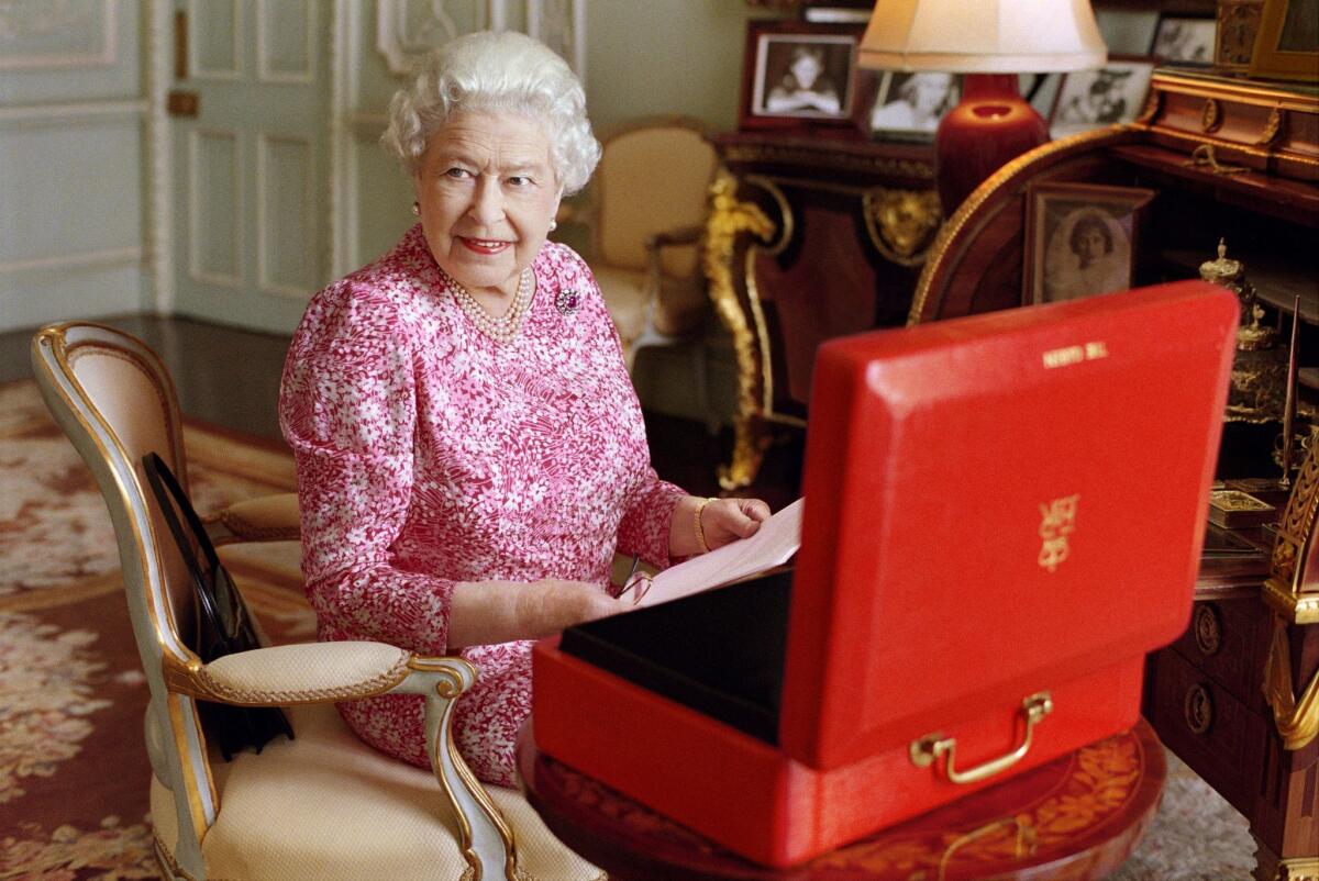 Britain's Queen Elizabeth II, shown in July 2015, is the longest-reigning monarch in the country's history.