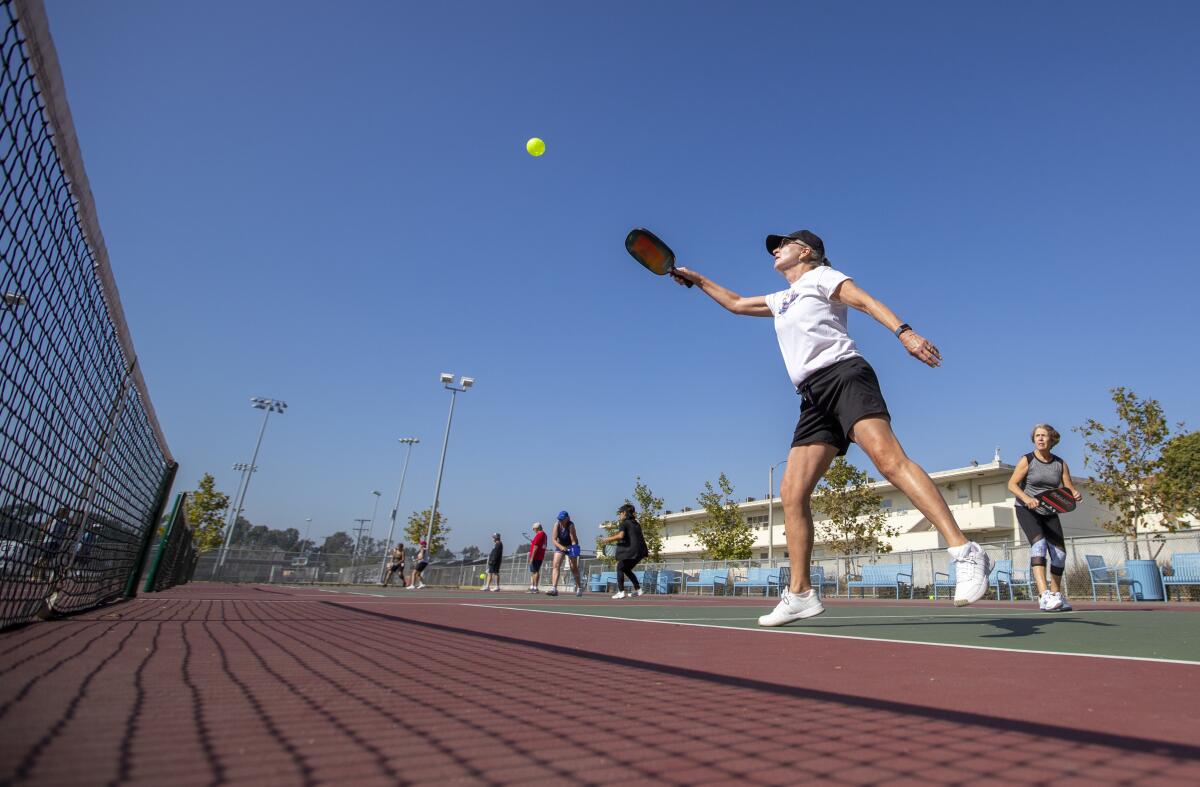 Pickleball player Deirdre Gan, left, with teammate Vicki DeVore.