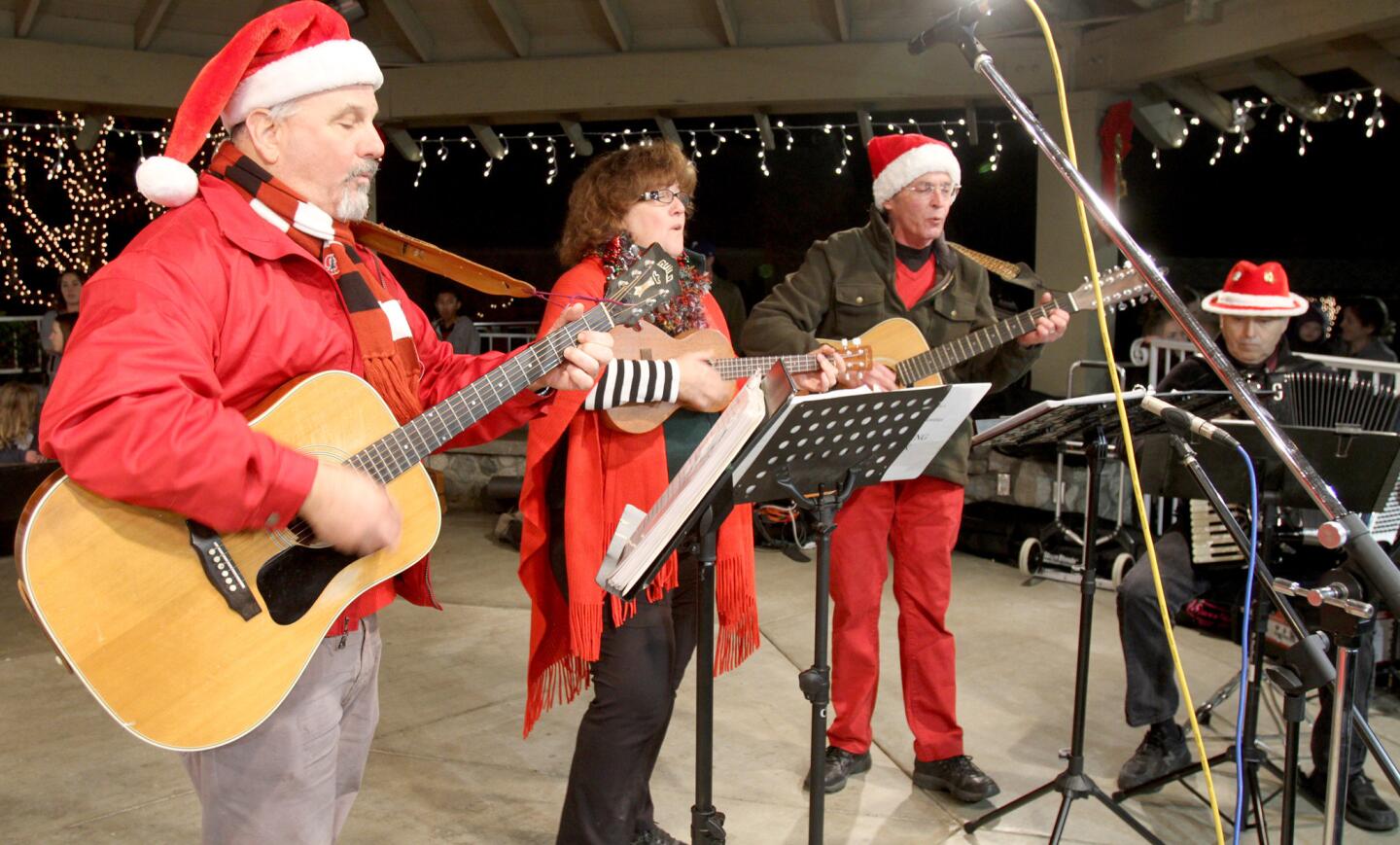 The band Misplaced Priorities played holiday songs during the 21st Festival in Lights at Memorial Park in La Cañada Flintridge on Friday, Dec. 4, 2015.