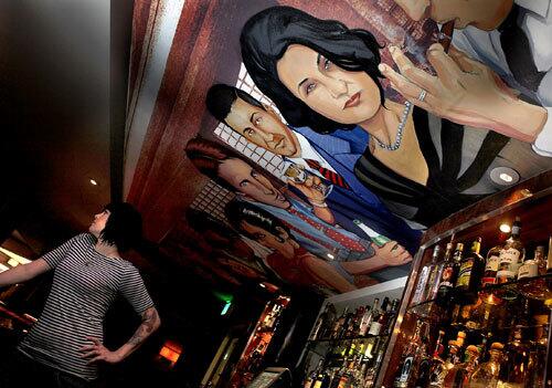 The Dining Room is in the Shangri-La hotel. Owner Tehmina Adaya is depicted in black in a painting above the bar. Executive chef Dakota Weiss, left, has recently added a $15 three-course menu on Tuesday nights.
