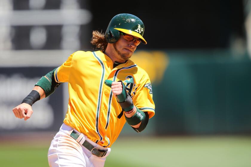 Athletics outfielder Josh Reddick rounds the bases against the Astros on July 20.