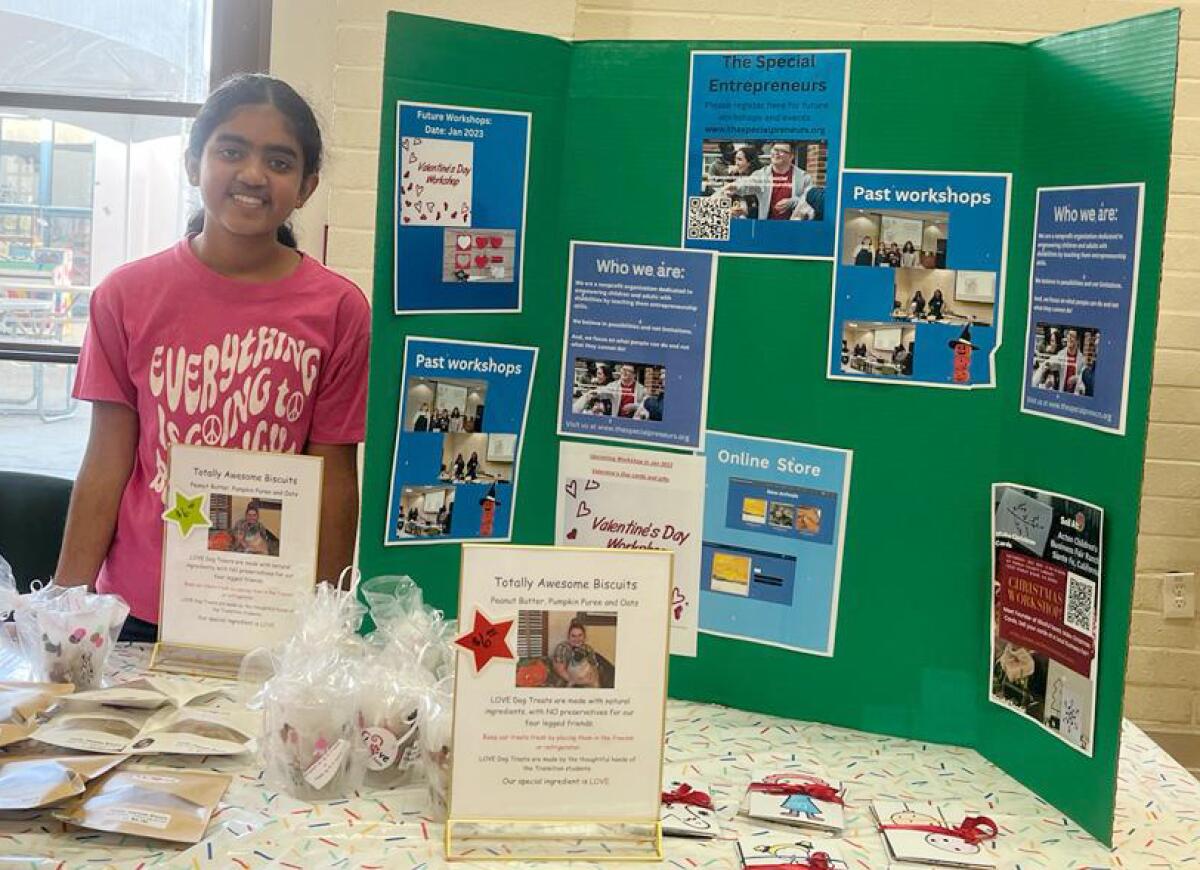 At a trade show, Vidhi Kulkarni sold dog treats made by Abraxas High School students and Christmas cards made by people with disabilities.