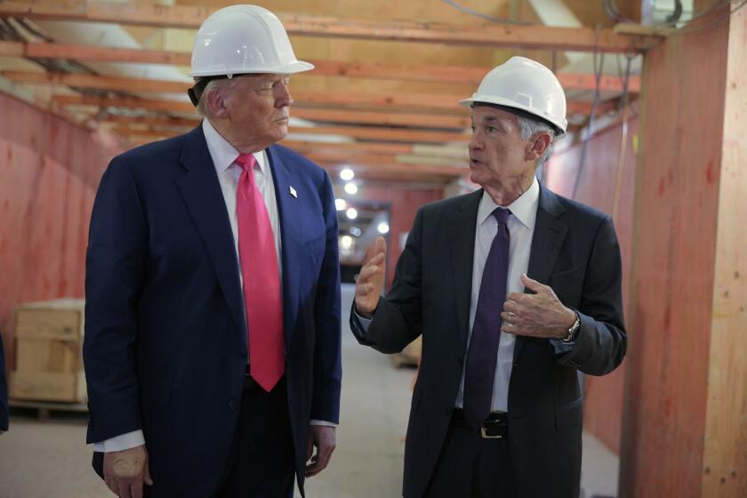 US President Donald Trump and Federal Reserve Chair Jerome Powell tour the Federal Reserve’s headquarters renovation project in Washington, DC on July 24. Photographer: Chip Somodevilla/Getty Images