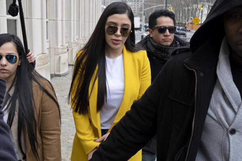 Emma Coronel Aispuro, center, wife of Joaquin "El Chapo" Guzman, arrives at federal court, Monday, Feb. 11, 2019, in New York. A jury is deliberating at the U.S. trial of the infamous Mexican drug lord. (AP Photo/Craig Ruttle)