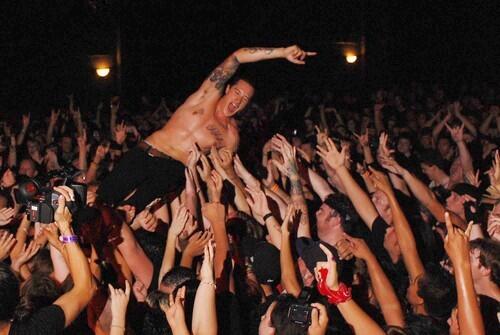 FANS: Hollywood Undead's Funny Man surfs the crowd in Tempe, Ariz.