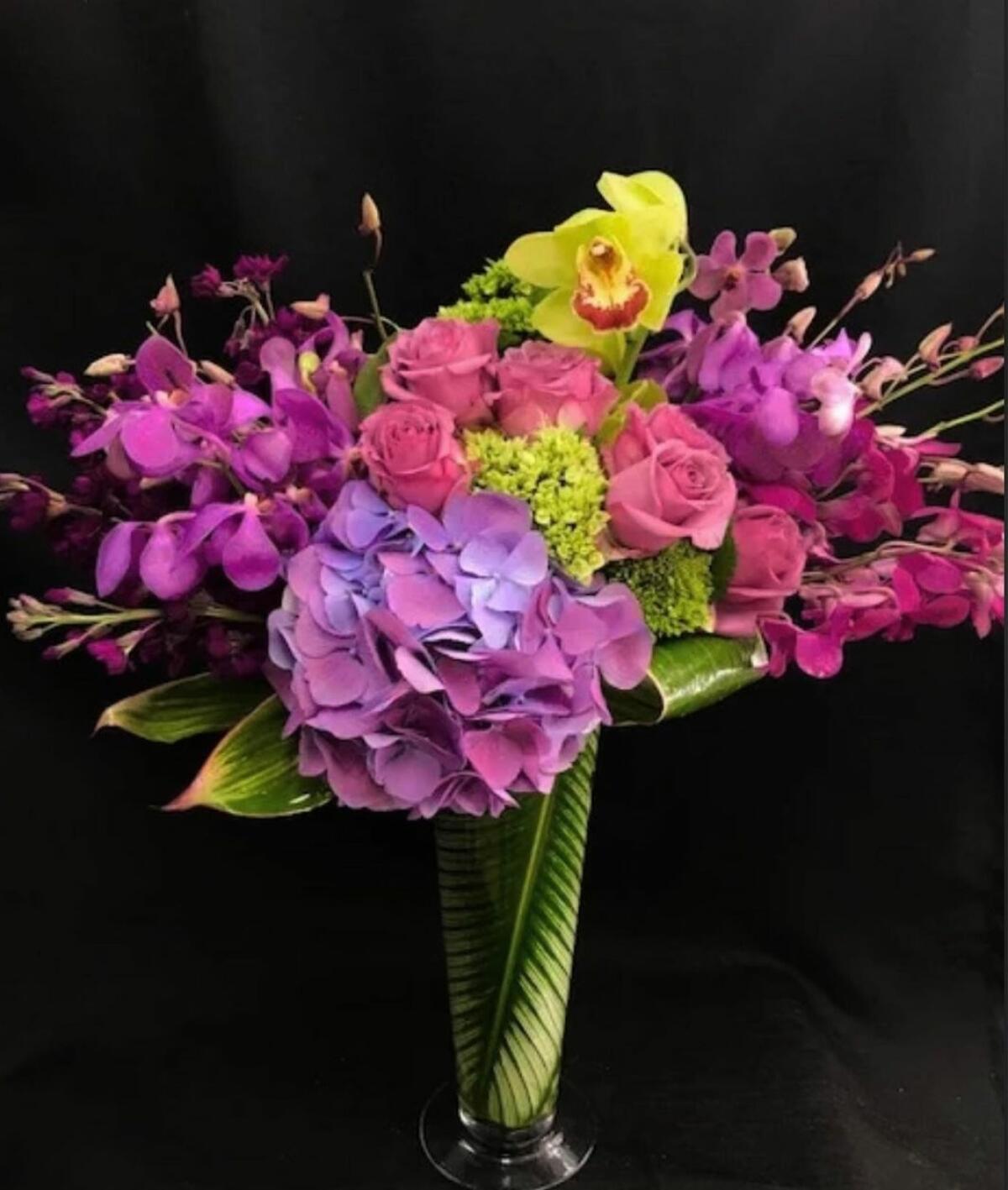 La Jolla Florist's custom arrangements can be as small as a “just because” bouquet to as large as a wedding display.