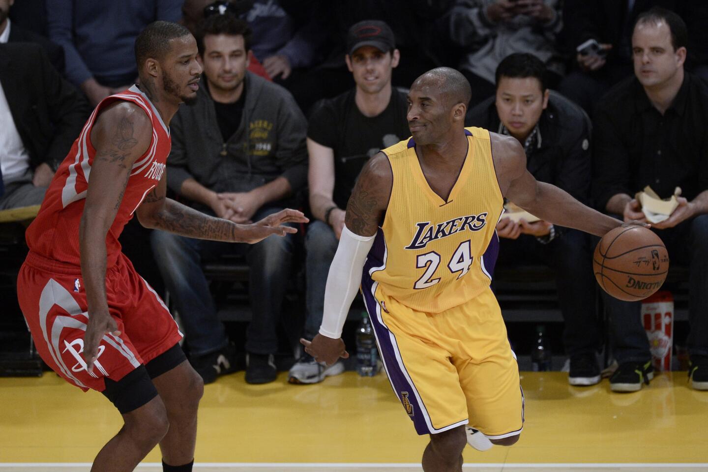 Lakers sluggish, Kobe Bryant sharp in 126-97 loss to Rockets