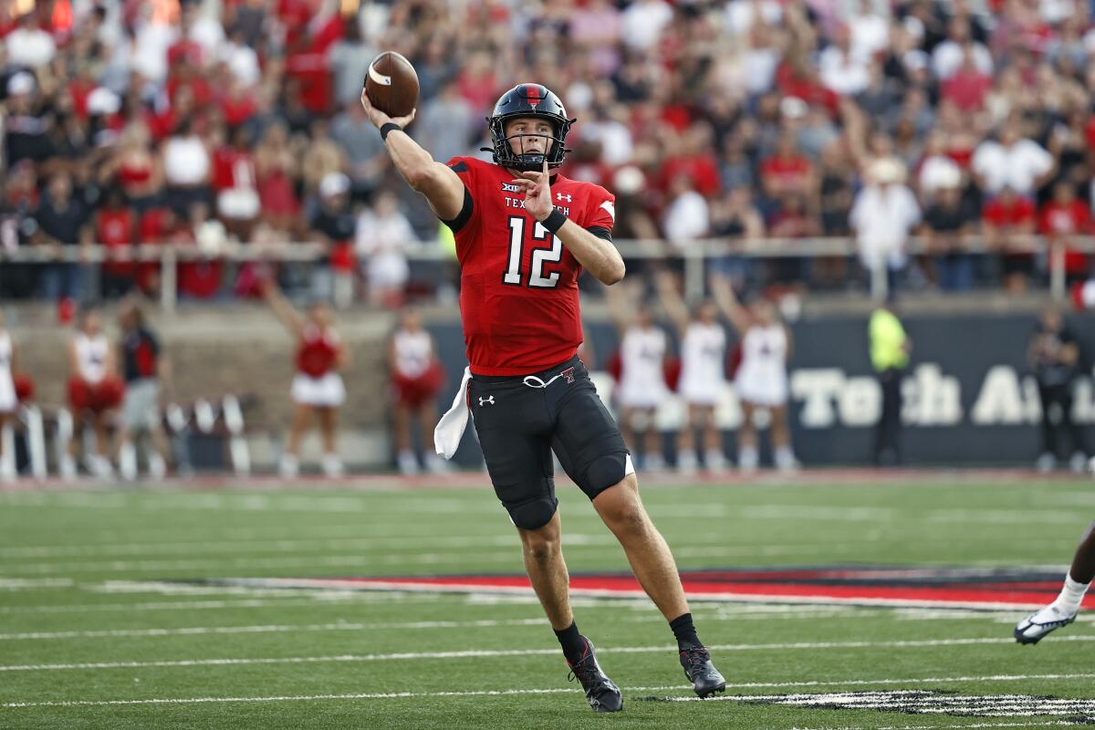 Texas Tech's Tyler Shough (12) passes the ball during the first half of an NCAA college football game against Murray State, Saturday, Sept. 3, 2022, in Lubbock, Texas. (AP Photo/Brad Tollefson)