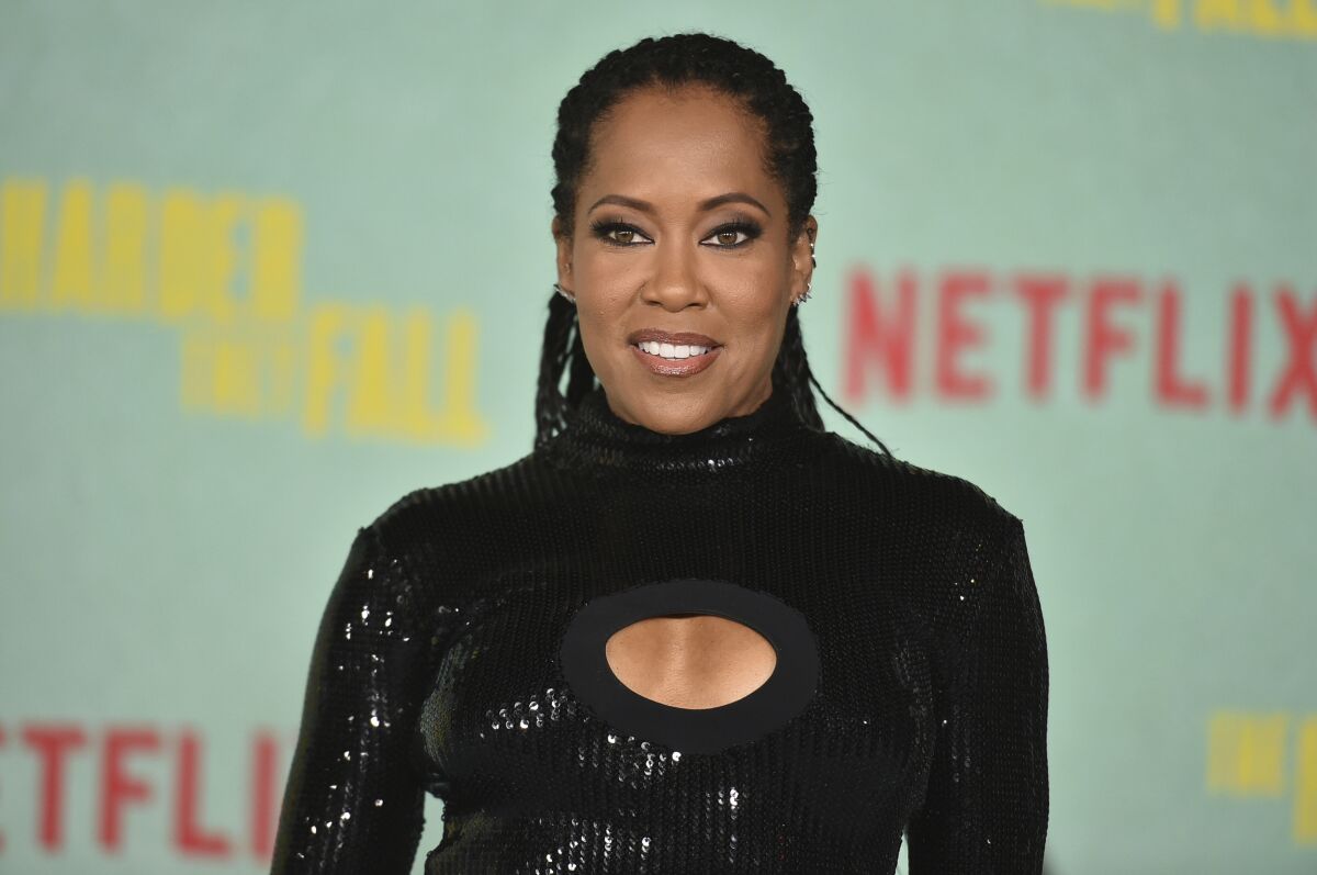 Regina King arrives at a special screening of "The Harder They Fall" on Oct. 13, 2021.