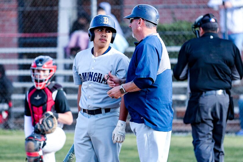 Birmingham coach Matt Mowry has a conversation with David Castaneda. Patriots are 4-0.