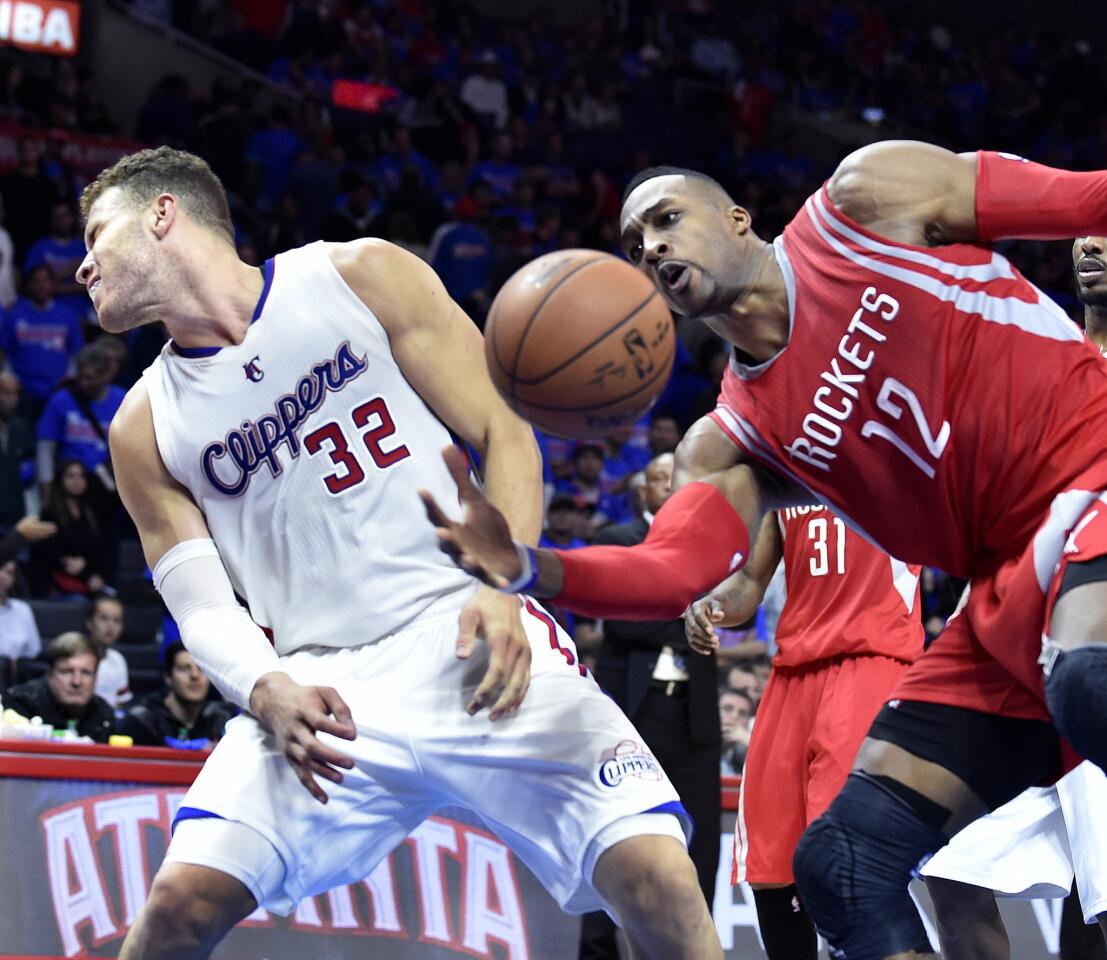Clippers forward Blake Griffin (32) picks up his sixth foul when preventing Rockets center Dwight Howard from scoring in the lane in the fourth quarter of Game 6.