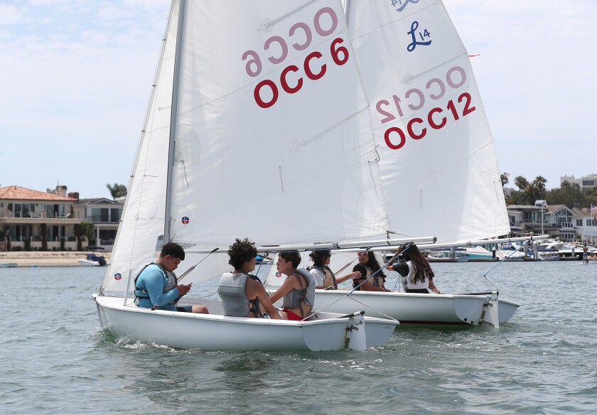 Two groups of teens participate in the Save Our Youth program from OCC Sailing & Seamanship course.