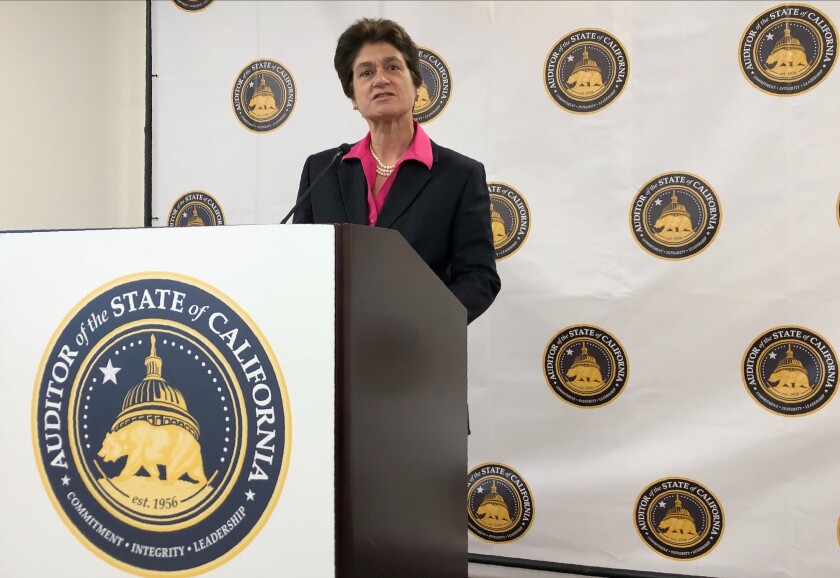 FILE - In this Oct. 24, 2019, file photo, California State Auditor Elaine Howle speaks during a news conference in Sacramento, Calif. A new audit says California did not meet its goal of hiring contact tracers for the pandemic. The California Department of Public Health set a goal of 31,400 contact tracers statewide. But the state had 12,100 contact tracers in January when the virus was spreading rapidly. Howle said even if the state had met its goal it still would not have been enough. (AP Photo/Adam Beam, File)