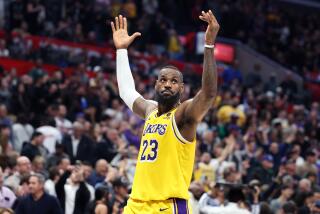 Los Angeles, California February 28, 2024-Lakers LeBron James celebrates the win against the Clippers at the end of the game at Crypto.com Arena Wednesday. (Wally Skalij/Los Angeles Times)