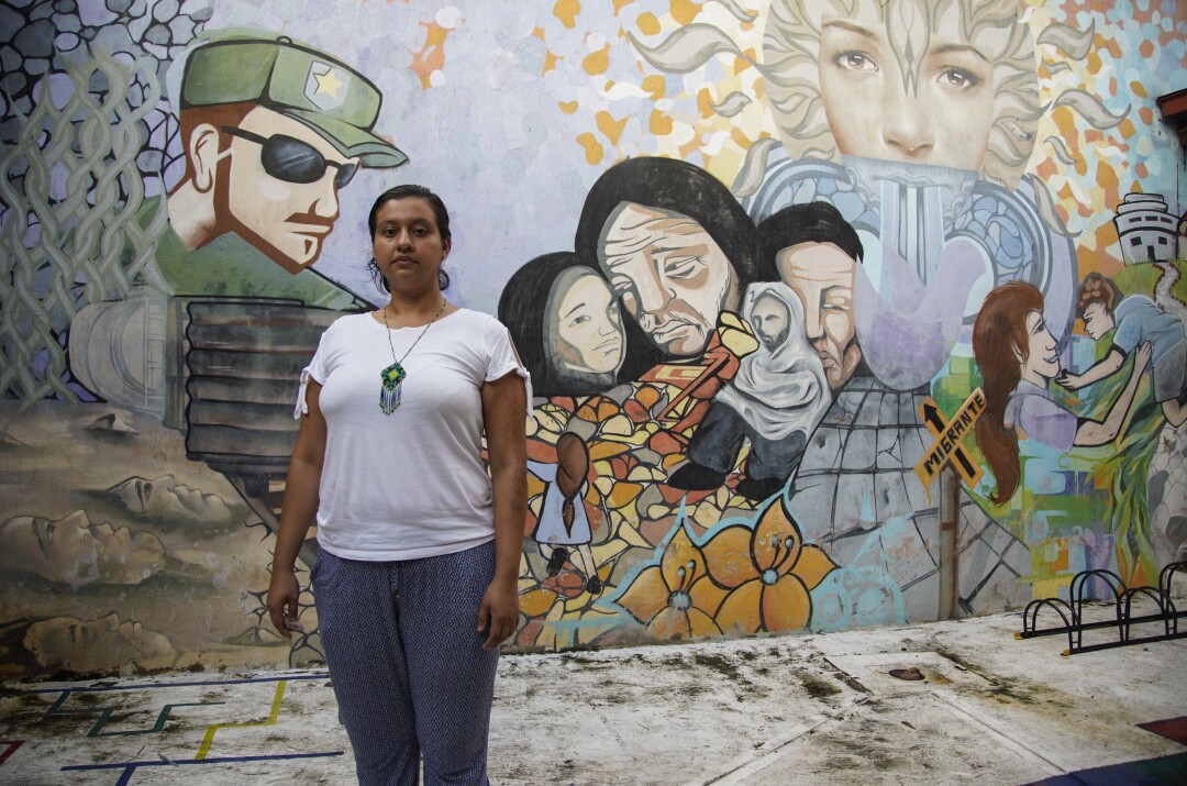 Yuriria Salvador stands in a court yard at the human rights center where she works