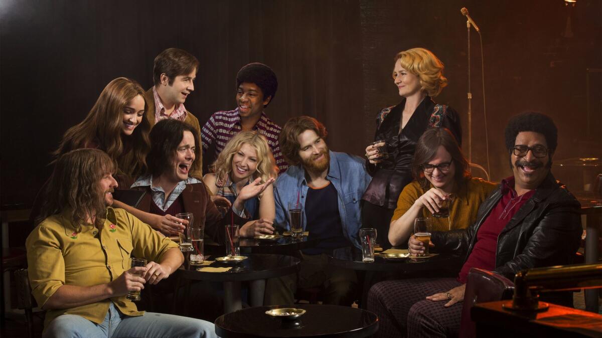 Brianne Howey as Kay, Michael Angarano as Eddie, RJ Cyler as Adam and Melissa Leo as Goldie; (seated) Stephen Guarino as Sully, Jon Daly as Arnie, Ari Graynor as Cassie, Andrew Santino as Bill, Clark Duke as Ron and Erik Griffin as Ralph in Showtime's series "I'm Dying Up Here." (Mathieu Young / Showtime)