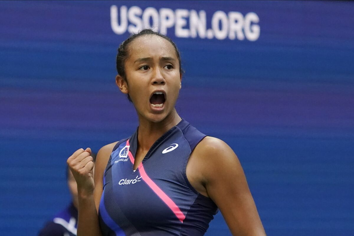 Leylah Fernandez, of Canada, reacts after scoring a point against Emma Raducanu, of Britain, during the women's singles final of the US Open tennis championships, Saturday, Sept. 11, 2021, in New York. (AP Photo/Elise Amendola)