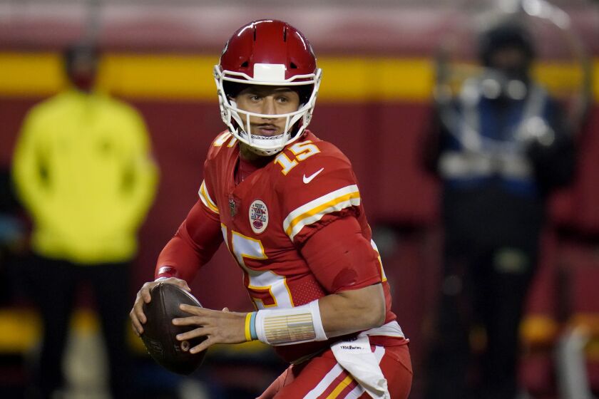 Kansas City Chiefs quarterback Patrick Mahomes drops back to pass during the first half of an NFL football game against the Denver Broncos Sunday, Dec. 6, 2020, in Kansas City, Mo. (AP Photo/Jeff Roberson)