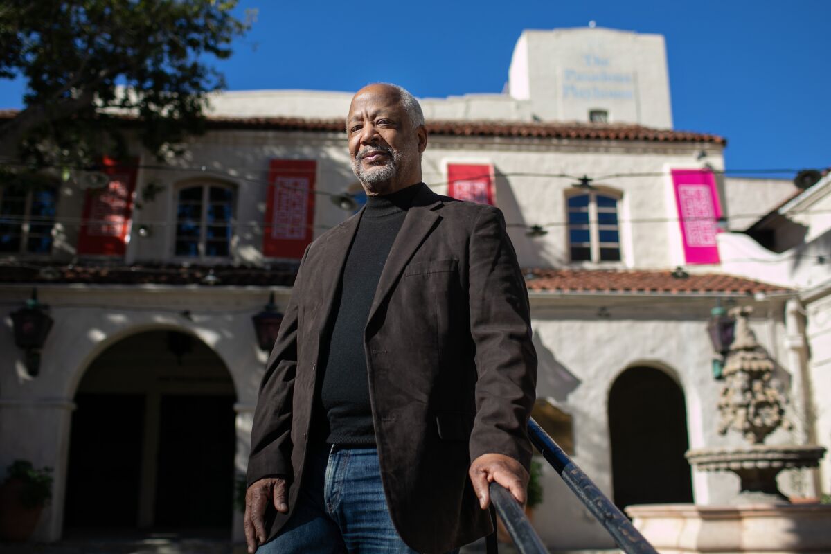 Sheldon Epps stands in the Pasadena Playhouse courtyard.